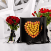 A classy black flower box with 780g of our finest specially themed wrapped chocolates finished with a beautiful red roses bouquet.